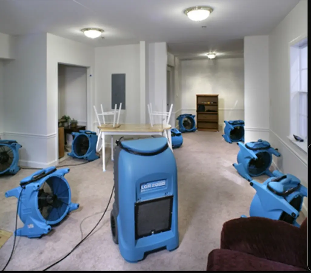 Air movers and dehumidifier setup for Water Damage Restoration in Salamanca